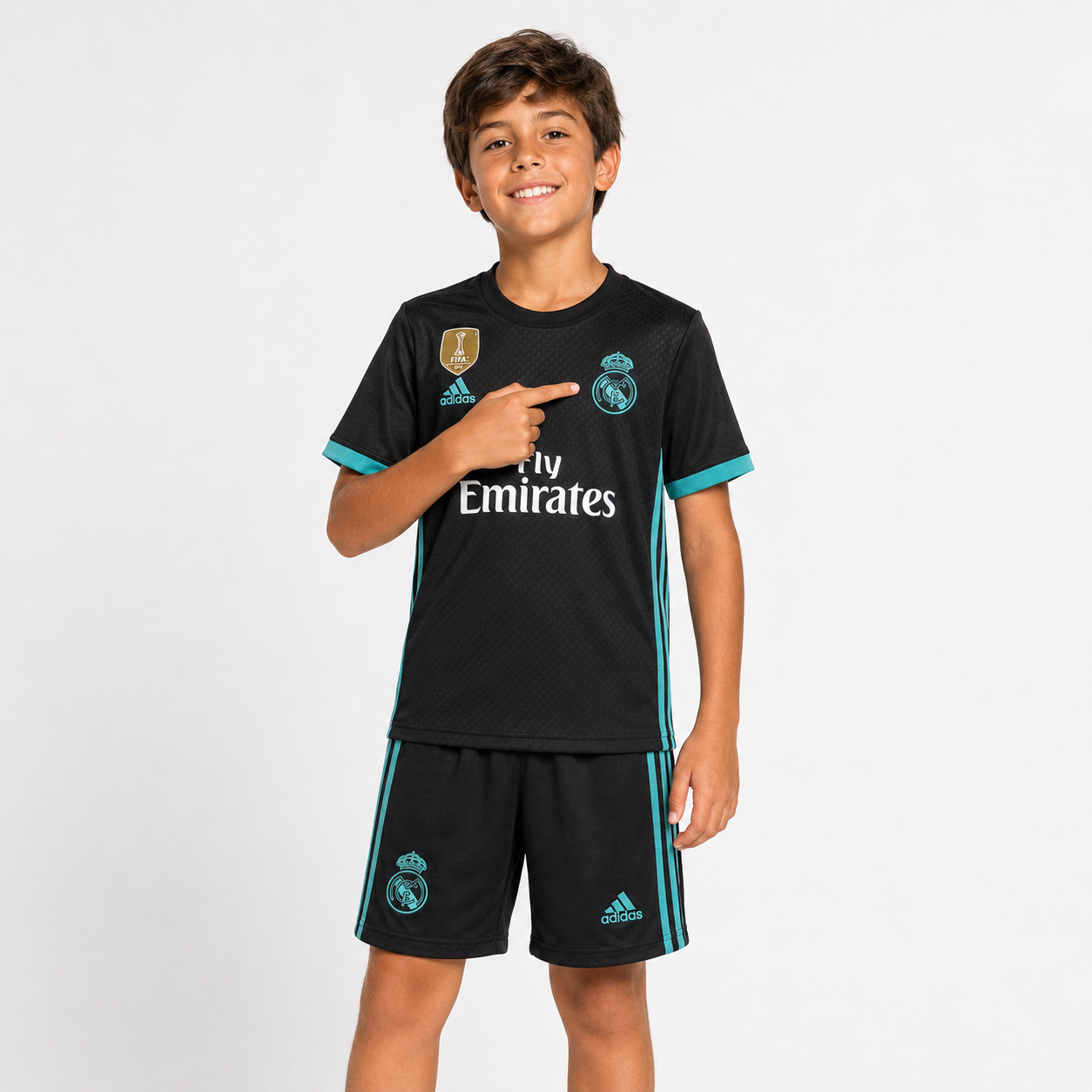Child model wearing Real Madrid 2017 kids football kit